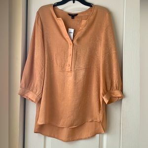 Banana Republic Shiny Tunic Blouse that has never been worn.
